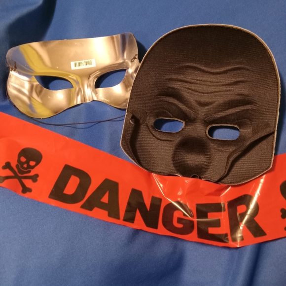 Two Halloween mask in good condition and danger and skull bones tape. - Picture 3 of 4